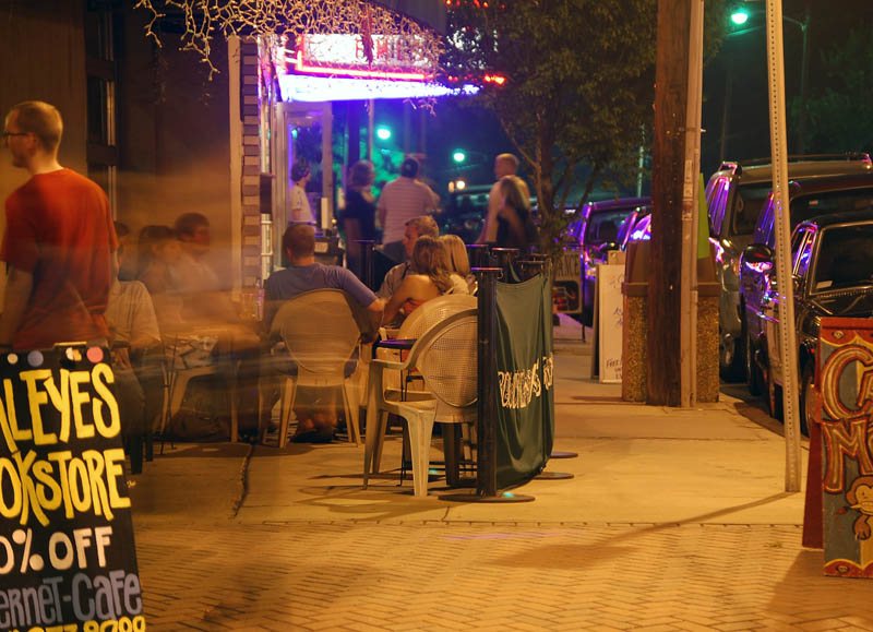outdoor diners and murals along North Davidson Street in NoDa, Charlotte
